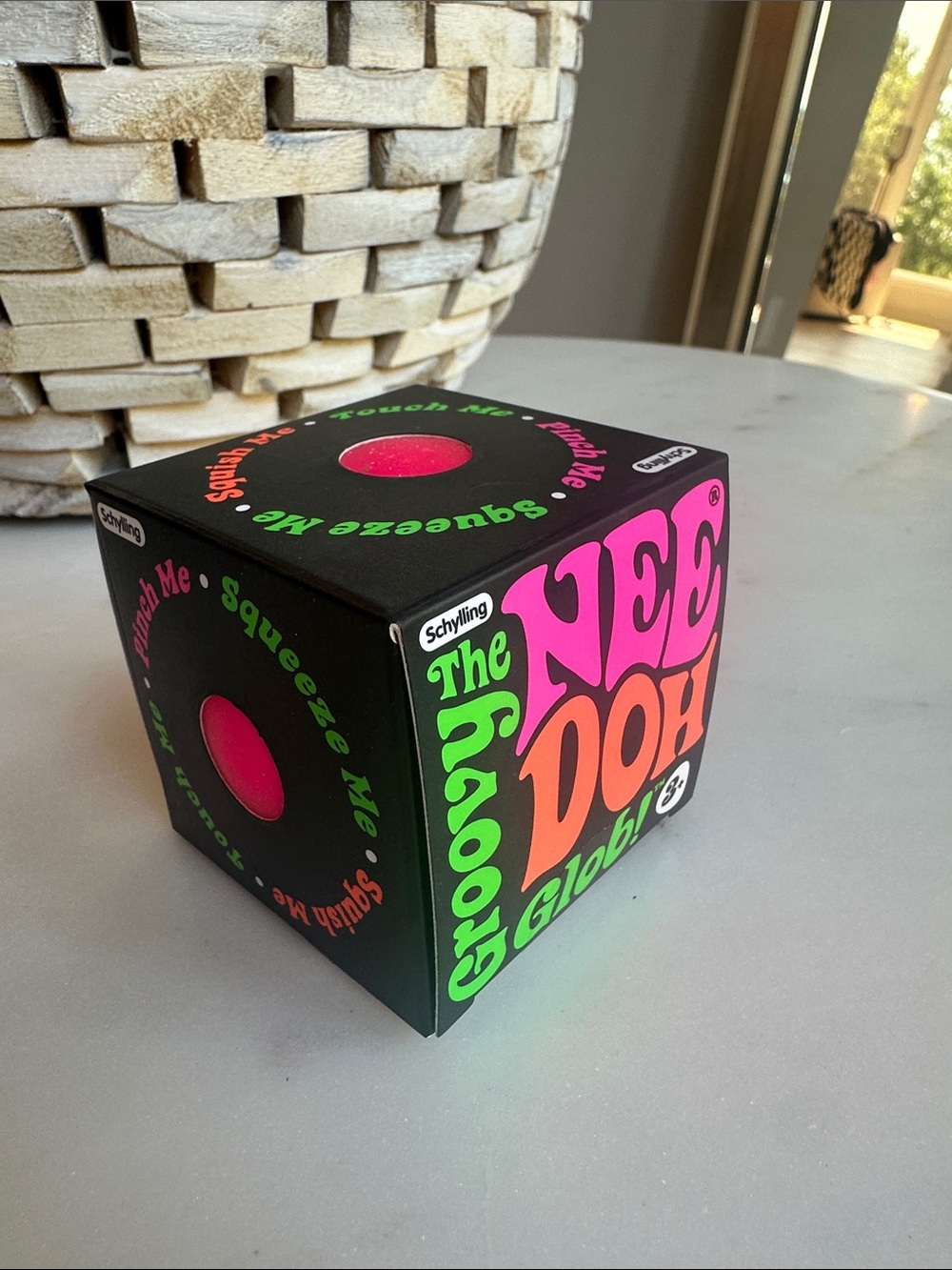The Ne Doh Globe Squeeze Toy Cube - Neon Pink, Green & Orange